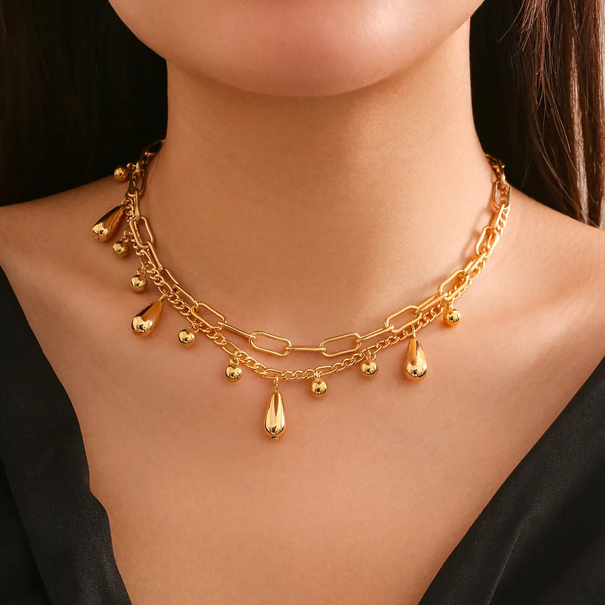 Golden Cascade: Dual-Layer Water Drop Pendant Bracelet
