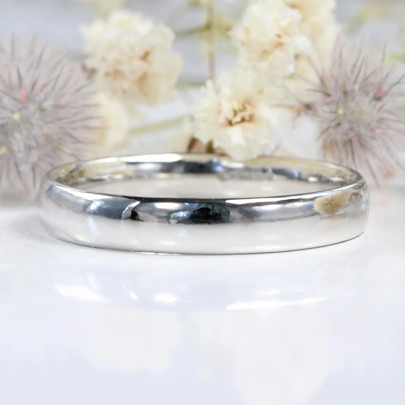 Platinum Polished 4mm Comfort Fit (Court) Wedding Ring