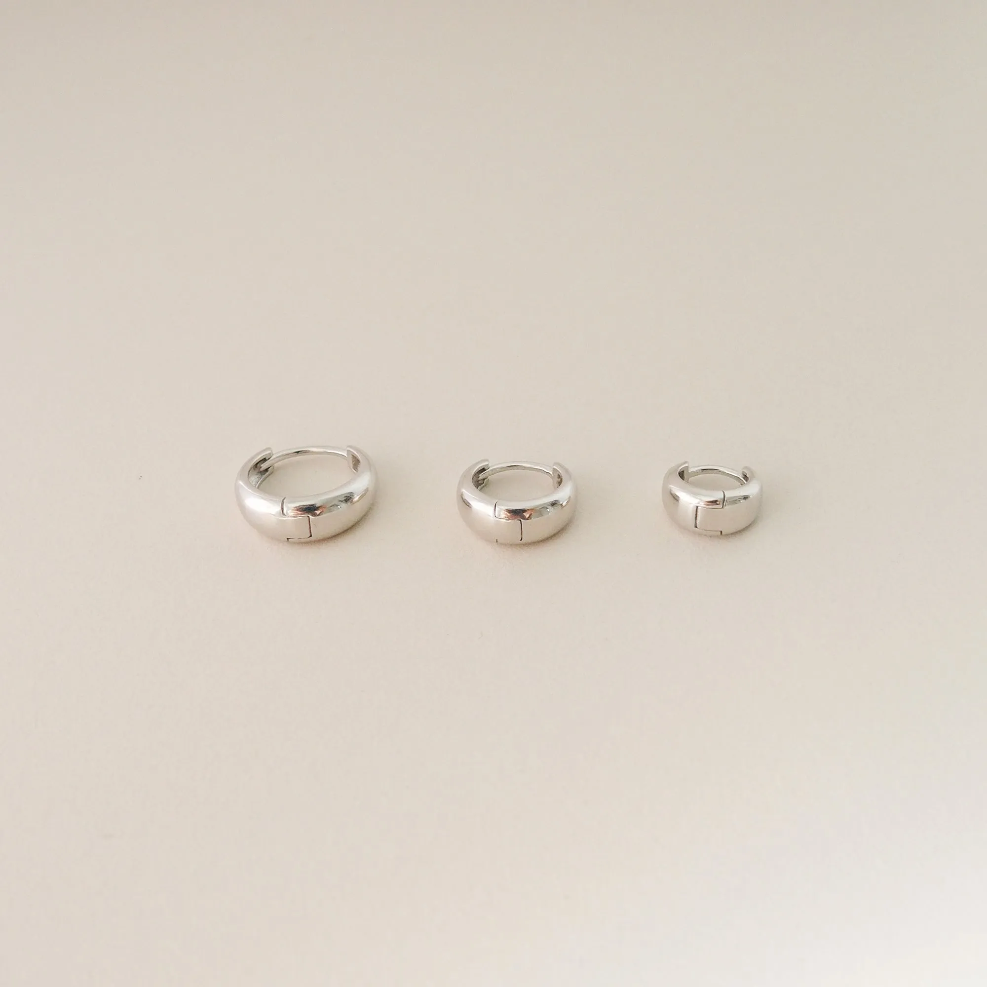 Tapered Huggie Hoops in Silver